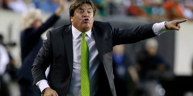 Mexico head coach Miguel Herrera yells during the first half of the CONCACAF Gold Cup championship soccer match against Jamaica, Sunday, July 26, 2015, in Philadelphia. (AP Photo/Matt Rourke)