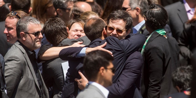 May 5, 2015: Mourners leave a memorial service for SurveyMonkey CEO David Goldberg on Tuesday, May 5, 2015, in Stanford, Calif. Goldberg, the 47-year-old husband of 'Lean In' author and Facebook executive Sheryl Sandberg, died in an accident while exercising at a Mexican vacation resort on Friday, May 1. Authorities say he apparently slipped on a treadmill and struck his head. (AP Photo/Noah Berger)