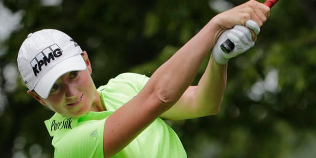FILE - In this Sunday, July 12, 2015, file photo, Stacy Lewis hits off the second tee during the final round of the U.S. Women's Open golf tournament at Lancaster Country Club in Lancaster, Pa. Golf waited 112 years to get back into the Olympics, and in the months leading up to the Rio Games, the biggest obstacle turned out to be getting its biggest stars to play. (AP Photo/Frank Franklin II, File)