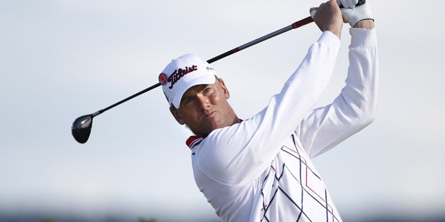 Robert Karlsson of Sweden hits his tee shot on the 10th hole during third round play at the British Open golf championship on the Old Course in St. Andrews, Scotland, July 17, 2010.