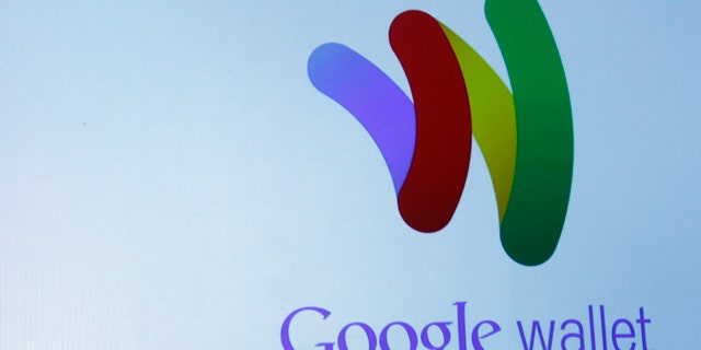 The Google Wallet logo is on display during a news conference, Thursday, May 26, 2011, in New York. Google wants the smartphone to be the wallet of the future, a container for digital credit cards, coupons, receipts and loyalty cards that can be "tapped" to terminals in stores.