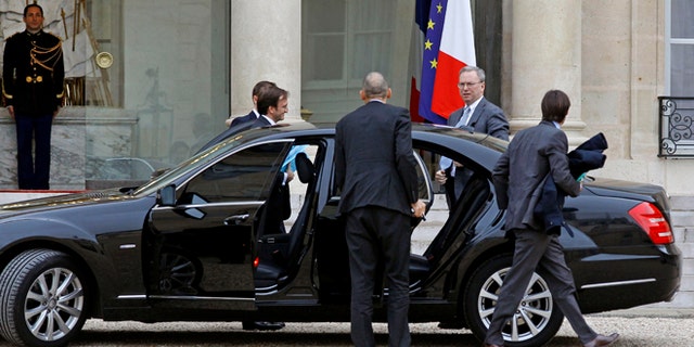 Oct. 29, 2012: Google executive chairman Eric Schmidt, second from right, arrives at the Elysee Palace for a meeting with French President Francois Hollande, in Paris.