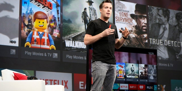 Dave Burke, director of engineering for Android, announces the Android TV during his keynote address at the Google I/O developers conference in San Francisco June 25, 2014. REUTERS/Elijah Nouvelage (UNITED STATES - Tags: BUSINESS SCIENCE TECHNOLOGY) - RTR3VQFQ