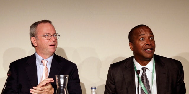 Google Executive Chairman Eric Schmidt (L) and David Drummond, Google's Senior Vice President of Corporate Development, react before a meeting about the 'right to be forgotten,' in Madrid on September 9.
