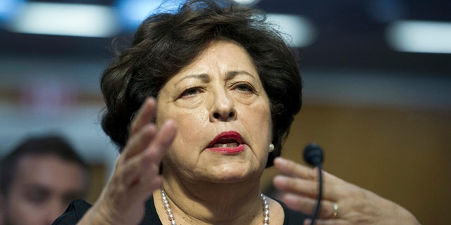 Katherine Archuleta, director, Office of Personnel Management, gestures while she testifies before the Senate Appropriations subcommittee on Financial Services and General Government hearings to review IT spending and date security at the Office of Personnel Management  in Washington, Tuesday, June 23, 2015. (AP Photo/Cliff Owen)