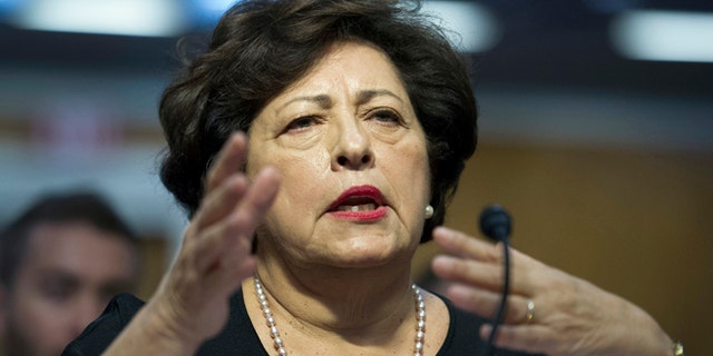 Katherine Archuleta, director, Office of Personnel Management, gestures while she testifies before the Senate Appropriations subcommittee on Financial Services and General Government hearings to review IT spending and date security at the Office of Personnel Management in Washington, Tuesday, June 23, 2015. (AP Photo/Cliff Owen)