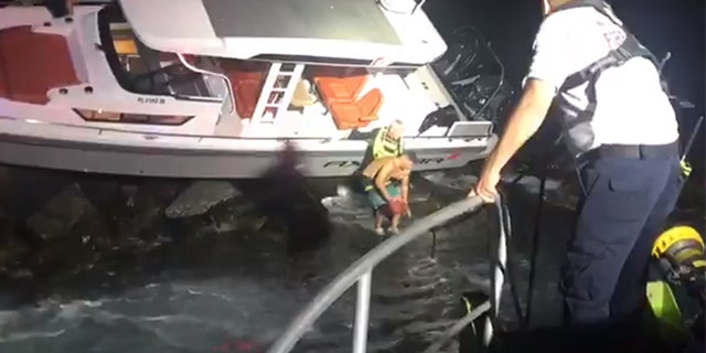 Three people had to be rescued after a boat rammed into a jetty close to where late Miami Marlins pitcher Jose Fernandez was killed in a 2016 crash.
