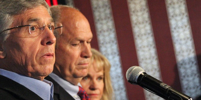 September 2, 2014: Former Alaska Democratic party gubernatorial candidate Byron Mallott, left, appears with independent candidate Bill Walker, middle, at a news conference in Anchorage. Walker and Mallott will combine on a unified ticket to face Republican Gov. Sean Parnell in the general election. (AP Photo/Mark Thiessen)