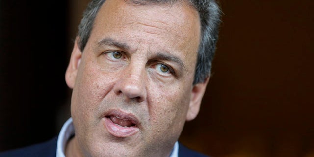 July 12, 2014: New Jersey Gov. Chris Christie talks with the media at the National Governors Association convention in Nashville, Tenn. (AP Photo/Mark Humphrey)