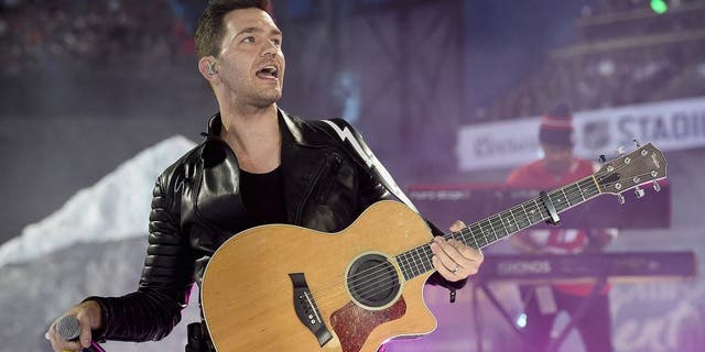 DENVER, CO - FEBRUARY 27: Recording artist Andy Grammer performs during pregame of the 2016 Coors Light Stadium Series game between the Detroit Red Wings and the Colorado Avalanche at Coors Field on February 27, 2016 in Denver, Colorado. (Photo by Brian Babineau/NHLI via Getty Images)