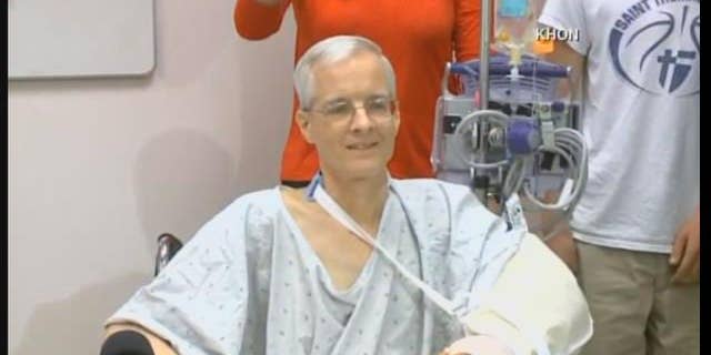 This image, obtained by Fox affiliate KHON, shows Ken Grasing, of Overland Park, Kansas, who was attacked by a 12-foot shark in Hawaii.