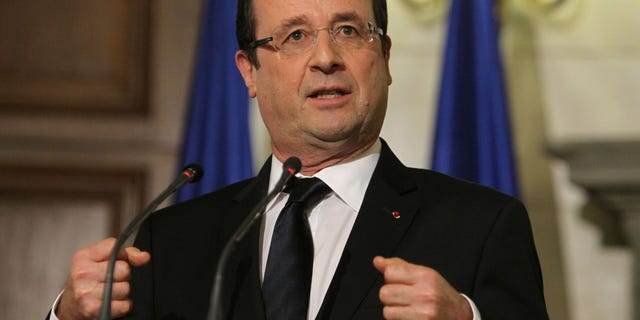 Feb. 19, 2013 -FILE photo of French President Francois Hollande speaks at a news conference in Athens.