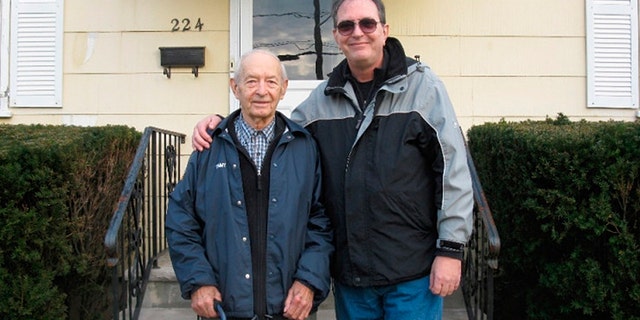 Greg Woienski (right) was headed off to his father's funeral when the incident allegedly occurred.