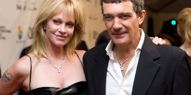 This Sept. 7, 2008 file photo shows actors Antonio Banderas, right, and his wife Melanie Griffith at the gala premiere of "The Other Man" at the Toronto International Film Festival in Toronto.