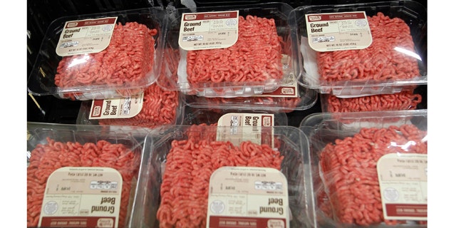Packs of ground beef are seen in a crate at the Fresh & Easy Neighborhood Market meat processing facility in Riverside, California, March 29, 2012. U.S. meat packers' losses on beef sales have doubled since a controversy over ammonia-treated scraps dubbed "pink slime" exploded two weeks ago, with margins nearing their lowest in at least 22 years on Thursday, an industry estimate showed. Fresh & Easy says they do not use the ammonia-treated filler in their beef products. REUTERS/Alex Gallardo (UNITED STATES - Tags: FOOD ANIMALS BUSINESS)
