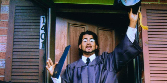 FILE 1999: Majid Khan gestures during his high school senior year in Baltimore, MD.