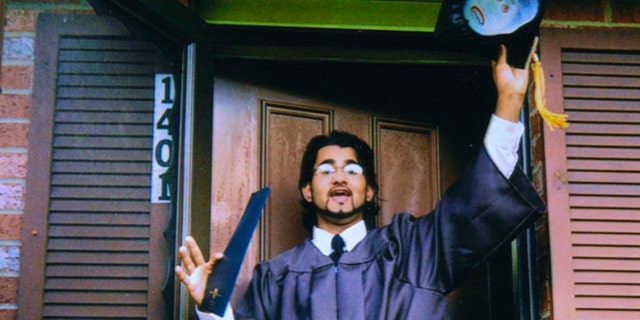 FILE 1999: Majid Khan gestures during his high school senior year in Baltimore, MD.