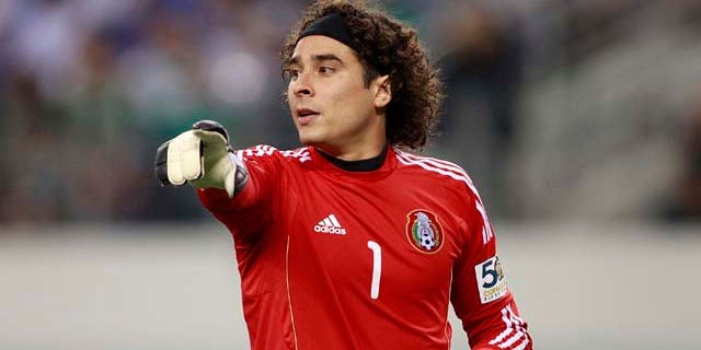 ARLINGTON, TX - JUNE 05: Guillermo Ochoa #1 of Mexico gestures to the referee during the match against El Salvador at the CONCACAF Gold Cup qualifying match at Cowboys Stadium on June 5, 2011 in Arlington, Texas. (Photo by Rick Yeatts/Getty Images)