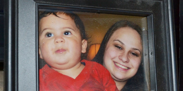 Photo provided by the family shows Bryson Mees-Hernandez, 9 months, with his mother, Crystal Mees, in Houston.