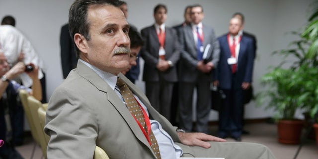 Cuban Foreign Ministry Deputy Director of the Directorate General of United States Gustavo Machín Gómez joins other members of the Cuban delegation during a news conference after migration talks between the U.S. and Cuba at the Palacio de las Convenciones de La Habana January 21, 2015 in Havana, Cuba. (Photo by Chip Somodevilla/Getty Images)