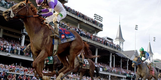 Jockey Mario Gutierrez rides I'll Have Another to victory in the 138th Kentucky Derby horse race at Churchill Downs Saturday, May 5, 2012, in Louisville, Ky. (AP Photo/David J. Phillip)