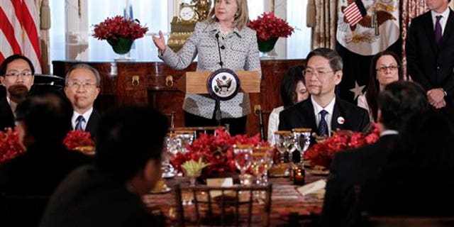 May 9: Secretary of State Hillary Clinton gives remarks during a dinner for the joint meeting of the U.S.-China Strategic and Economic Dialogue at the State Department.