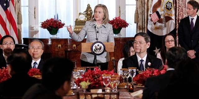May 9: Secretary of State Hillary Clinton gives remarks during a dinner for the joint meeting of the U.S.-China Strategic and Economic Dialogue at the State Department.