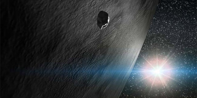 An illustration of the asteroid 24 Themis along with two small fragments that orbit with it. One of the small fragments is inert (as most asteroids are) and the other has a comet-like tail.