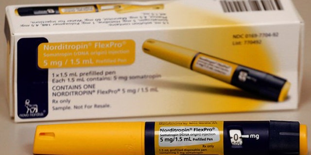 This photo shows an injector filled with human growth hormone, available with a prescription. (AP)