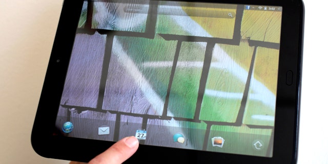 The HP TouchPad -- a tablet computer running Palm's WebOS operating system -- is displayed in San Francisco.
