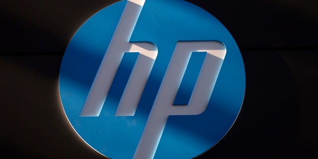 A Hewlett-Packard logo is seen at the company's Executive Briefing Center in Palo Alto, California January 16, 2013. REUTERS/Stephen Lam (UNITED STATES - Tags: BUSINESS SCIENCE TECHNOLOGY LOGO) - RTR3CJJC