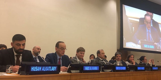 Hadi al-Bahra, who is a senior member of the negotiating team for the Syrian opposition, addresses an informal U.N. Security Council meeting Monday about what life was like for ordinary Syrians. (Syrian American Council)