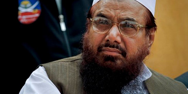 FILE - Lashkar-e-Taiba founder Hafiz Saeed, attends a ceremony in Islamabad, Pakistan.