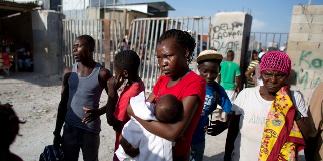 Haitian migrants just deported from Dominican Republic, at the border crossing in Malpasse, June 17, 2015.