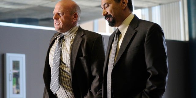 Hank Schrader (Dean Norris) (left) and Steven Gomez (Steven Michael Quezada) (right) appear in an epsiode of AMC's "Breaking Bad."
