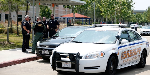 CYPRESS, TX - APRIL 09: Harris County Sheriff officers seal off the campus after at least 14 people were injured in a stabbing incident at the Cy-Fair campus of Lone Star College on April 9, 2013 in Cypress, Texas. The community college located in northwest Houston was on lockdown until police detained a 21-year-old male student believed to be a suspect. (Photo by Scott Halleran/Getty Images)