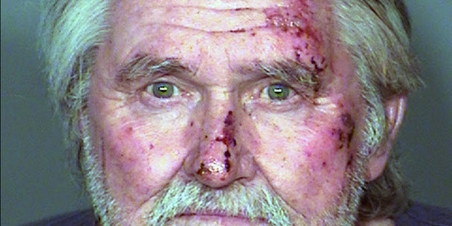 Feb. 2, 2015: This photo provided by the Las Vegas Metropolitan Police Department shows Larry Reid, the brother of U.S. Senate Democratic Leader Harry Reid. The Nevada Highway Patrol said that Larry Reid was arrested on misdemeanor driving under the influence, weapon, battery on an officer and other charges after he was found in a vehicle parked in a dirt median of a state highway. (AP Photo/Las Vegas Metropolitan Police Department)
