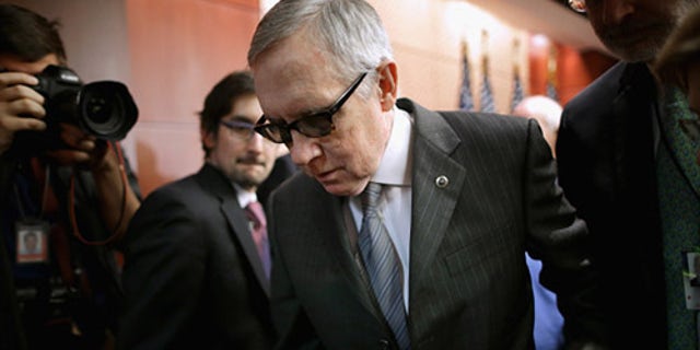 WASHINGTON, DC - FEBRUARY 24: Senate Minority Leader Harry Reid (D-NV) leaves a news conference where he accused Republican Senate leaders of manufacturing the possible shutdown of the Department of Homeland Security at the U.S. Capitol February 24, 2015 in Washington, DC. Democrats have successfully blocked the $39.7 billion funding legislation because it would also strip away the executive actions in which President Barack Obama eased the deportation threat for several million undocumented immigrants. If Republicans and Democrats can not work around the impasse then 30,000 DHS employees will go home February 28 and 200,000 more will work without paychecks until a solution is found. (Photo by Chip Somodevilla/Getty Images)