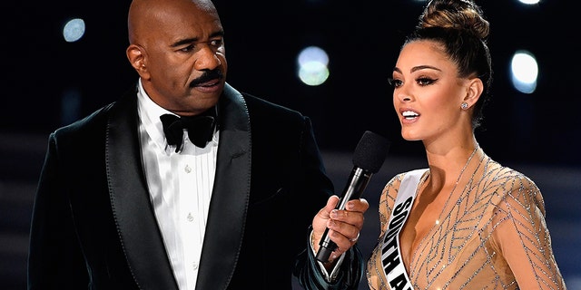 Steve Harvey with Demi-Leigh Nel-Peters at the 2017 Miss Universe pageant.