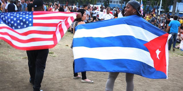 HAVANA, CUBA - MARCH 25: Rolling Stones fans wait for the start of a free concert March 26, 2016 in Havana, Cuba. Thousands of fans waited for the Rolling Stones to play for the first time in Cuba, after the music was once banned by the government. (Photo by Joe Raedle/Getty Images)
