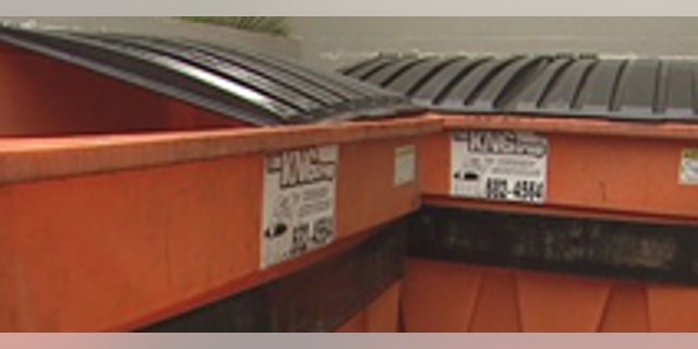 Mar. 12, 2012: Police search for clues after a child's fingers were found in this dumpster in Hawaii.