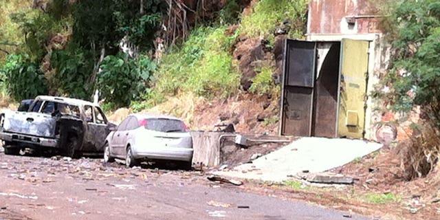 April 8: This image shows the entrance to the bunker where fireworks were stored at Waikele Business Center in Waipahu, Hawaii. At least two men were killed, injuring two others and two are missing after the explosion.