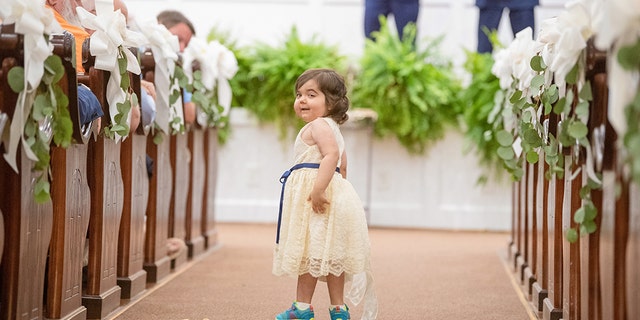 Skye's mom said she left the guests in tears as she tossed flowers down the aisle.