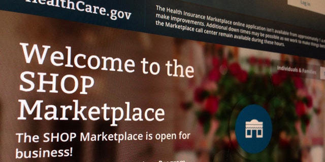 FILE - This Nov. 27, 2013, file photo shows part of the HealthCare.gov website page featuring information about the SHOP Marketplace is photographed in Washington, on Nov. 27, 2013. Trying to limit election-year damage on health care, the Obama administration Monday, Feb. 10, 2014, granted business groups another delay in a much-criticized requirement that larger firms cover their workers or face fines. (AP Photo/Jon Elswick, File)