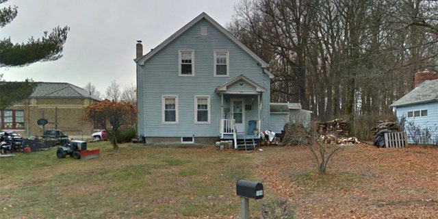 A woman died after falling into a fire pit at this home in Worcester, Massachusetts, fire officials said.