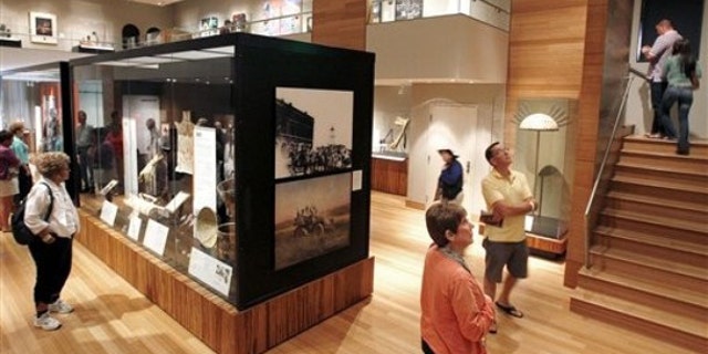 Feb. 12, 2012: Patrons walk through an exhibit featuring Geronimo and other Apache tribe warriors in history at The Heard Museum in Phoenix.