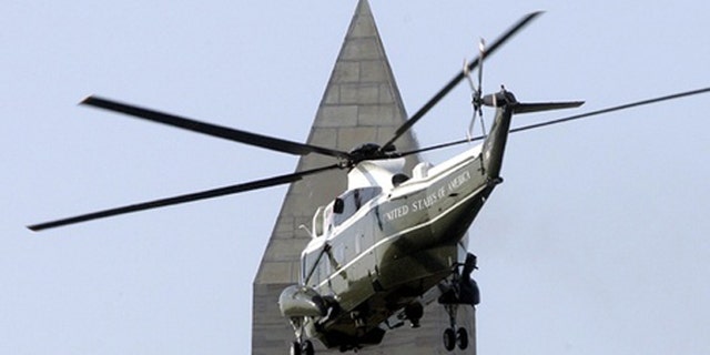 May 1, 2007: The Marine One helicopter carrying passes by the Washington Monument.