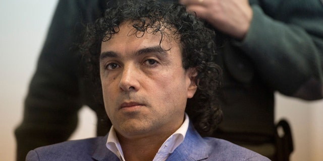 Colombian drug trafficker Henry de Jesus Lopez Londono aka "Mi Sangre" attends his extradition trial to the United States at court in Buenos Aires on May 17, 2016. / AFP / EITAN ABRAMOVICH (Photo credit should read EITAN ABRAMOVICH/AFP/Getty Images)