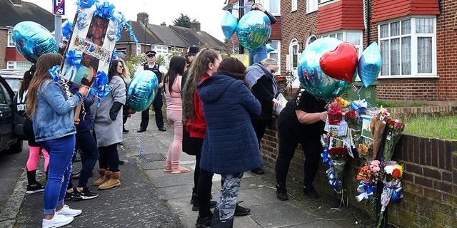 A group of women brought flowers and balloons to the spot in London where Henry Vincent was fatally stabbed in botched burglary at the home of an elderly man, Richard Osborn-Brooks. Vincent would have turned 38 Sunday.
