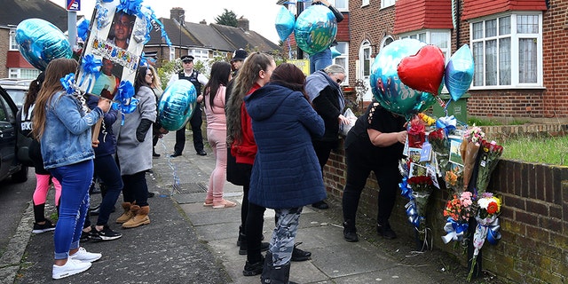 A group of women brought flowers and balloons to the spot in London where Henry Vincent was fatally stabbed in botched burglary at the home of an elderly man, Richard Osborn-Brooks. Vincent would have turned 38 Sunday.